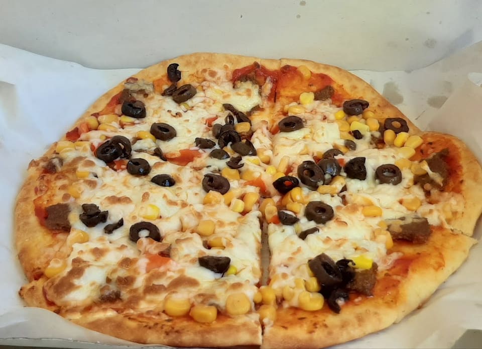 Pizza w Maajnat Al Ameed